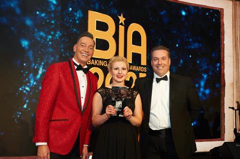 Dancing superstar Craig Revel Horwood with Evita Dambrauska, part of the winning team from Simply Doughnuts, and Unifiller sales manager Simon Lawton-Hayes