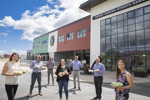 L to r: Village Bakery staff Monika Dzhipova, Andy Turner, Jason Page, Iveta Dzhipova, MD Robin Jones, Simon Thorpe and Isabella Pippa