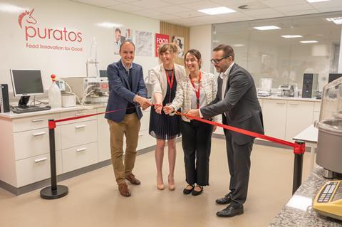 Puratos - Paul Baisier (left), chief R&D officer at Puratos, joins colleagues in opening the new Flour Competence Centre in Belgium
