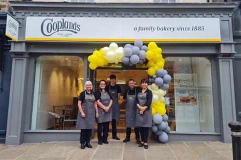 Staff outside Cooplands store