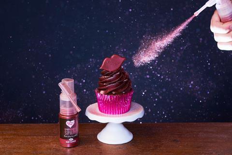 Rainbow Dust's ruby slipper coloured sparkle spray used to coat a chocolate frosted muffin