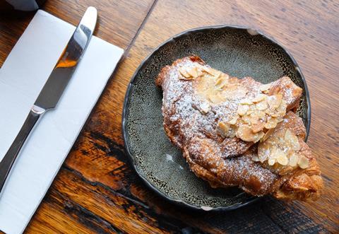 Almond croissant on plate