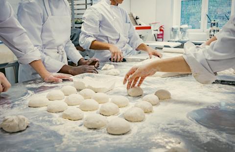 Students shaping dough