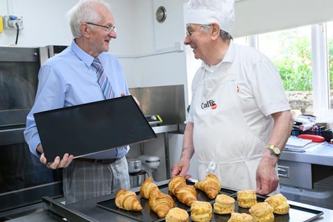 Invicta - Invcita coating specialist Trevor Talbot (left) talks with Dave Clarke, co-owner of Caffé Stop Bakery in Pickering, Yorkshire - 2100x1400