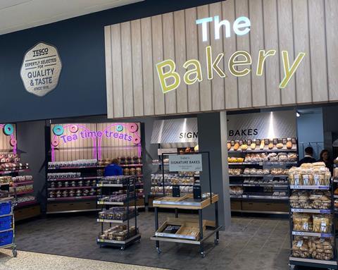 Tesco's in-store bakery with doughnuts and bread on display