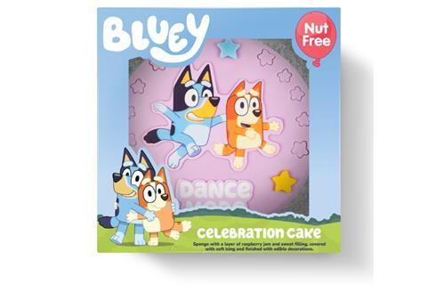 A celebration cake with Bluey and friends on top