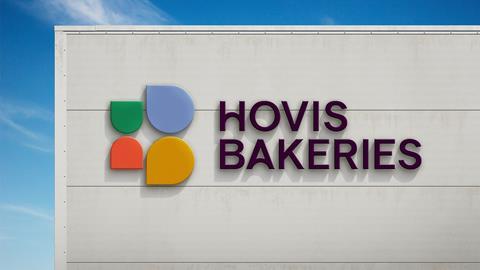 Hovis Bakeries new sign on a building against a blue background