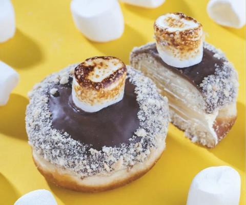 Smores doughnut with chocolate icing and a toasted marshmallow on top