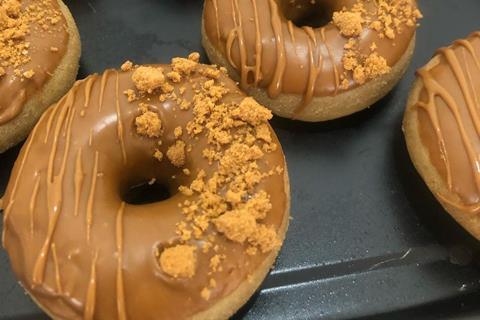 Ring doughnuts with caramel icing on top