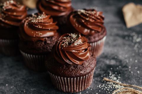 Chocolate cupcakes with glossy looking chocolate ganache on top