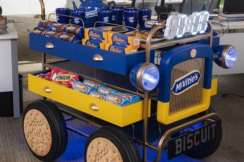 McVitie's customised tea trolley stocked with biscuits including Chocolate Digestives, Jaffa Cakes, Hobnobs, and Penguins  2100x1400