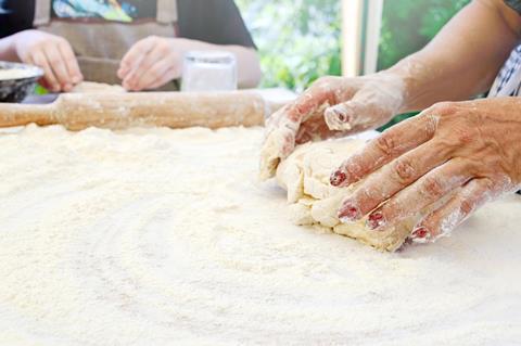 Hands kneading dough