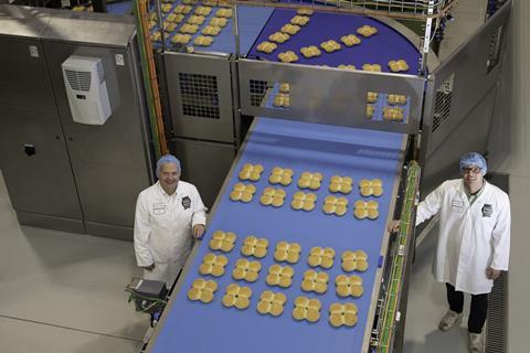 Mandy Jones - Jones Village Bakery CEO Simon Thorpe lefthead of operations Andy Beckett at the new roll line in the main Wrexham site