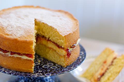Victoria sponge cake with a slice missing