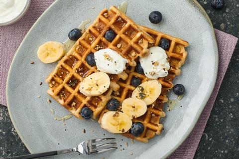 Ancient grain waffles with blueberries, banana and yoghurt on top