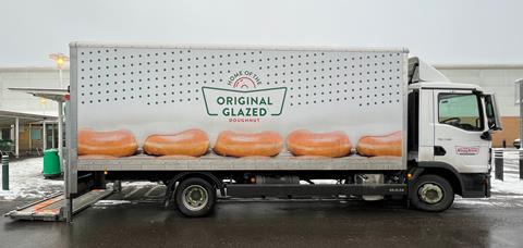 Krispy Kreme truck delivering to a supermarket in Crawley