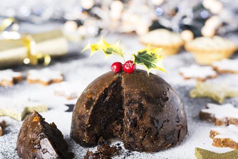Christmas pudding with a sprig of holly on top