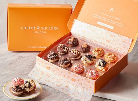 Cutter & Squidge Biskies in a bright orange box ready for posting