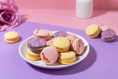 Mademoiselle Macaron pink, purple, and yellow macarons