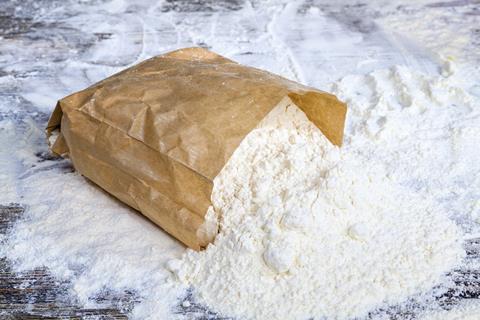 White flour in a paper bag