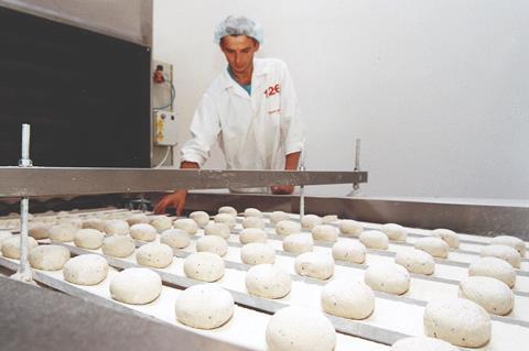 A dough processing line at Signature Flatbreads