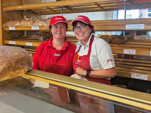 Sara Littlewood and Amanda Brown ready to welcome customers to the Stacey's bakery shop  2000x1502