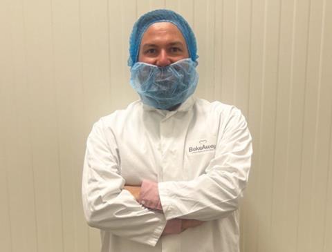 Elliot Cantrell, head of NPD at BakeAway in production whites  576x439