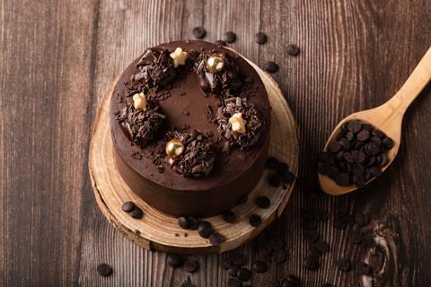 Chocolate cake on a wooden board