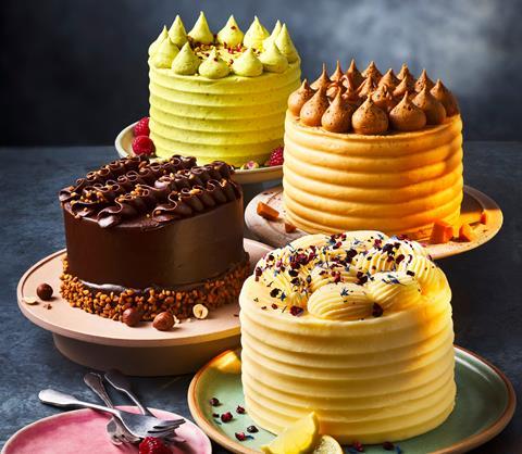 Four lovely looking celebrations cakes with lashings of frosting on top in pistachio, salted caramel, lemon, and chocolate flavours