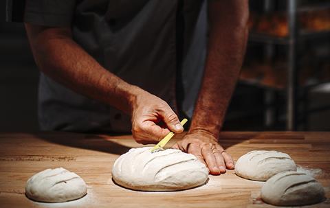 Scaritech - A baker scores dough with a Scaritech bread lame