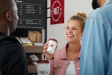 People drinking from Pret coffee cups