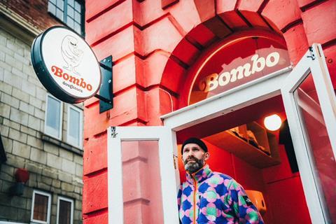Bombo Doughnuts founder Gareth Parker outside its store
