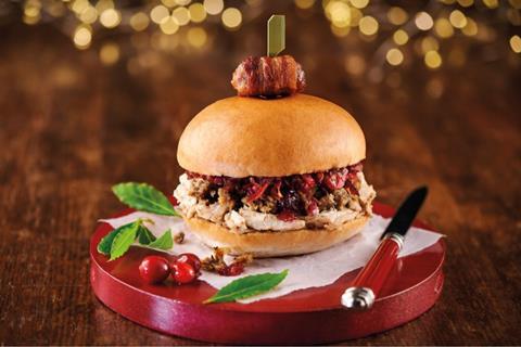 Irresistible Ultimate Christmas Dinner Roll with pig in blanket on top