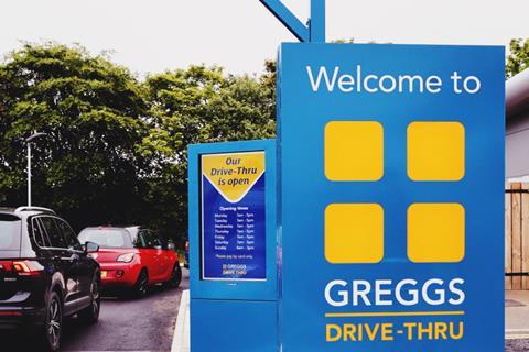 Greggs drive thru and opening hours sign