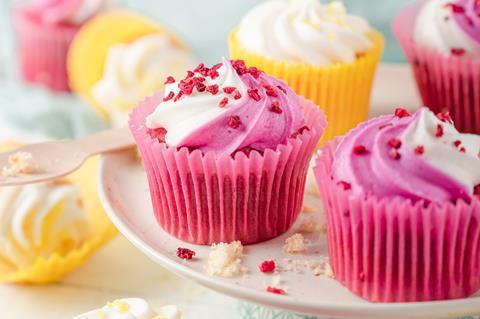 Pink cupcakes with pink and white swirled frosting
