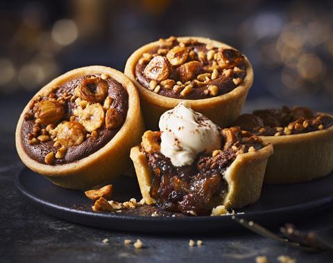 Chocolate & Hazelnut Mince Pies with a dollop of cream on top