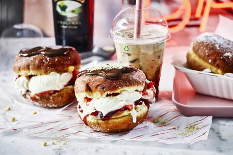 Cremella doughnuts filled with ice cream and topped with chocolate sauce