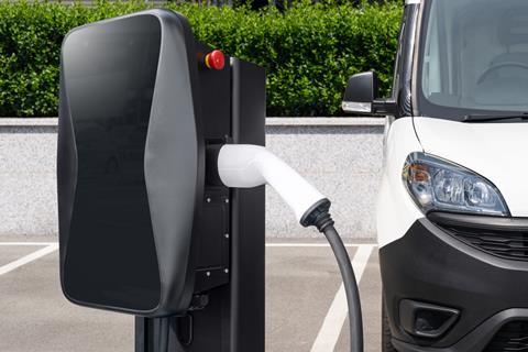 Electric delivery van with charging station.