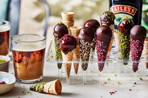 Ice cream cones with chocolate and sprinkles on