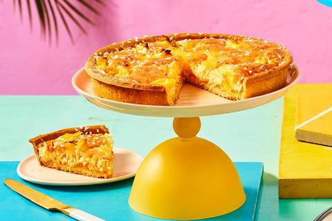 Tropical tart on a yellow cake stand