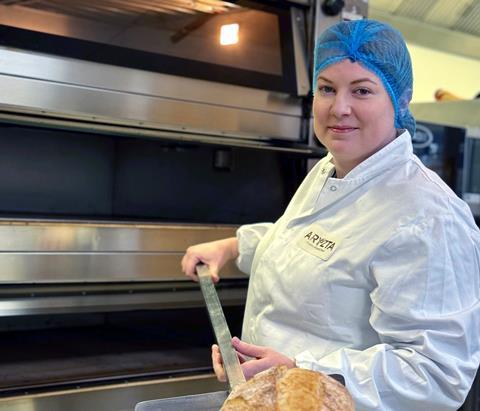 Mary Murphy, test baker at Aryzta, with a sourdough loaf fresh out of the oven