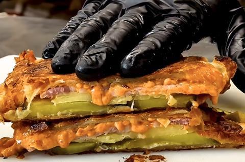 B.Bakery's toasty and juicy croissant filled with ham, cheese and gherkins