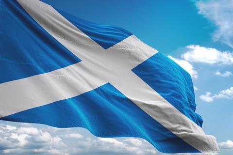Scottish flag against a blue sky