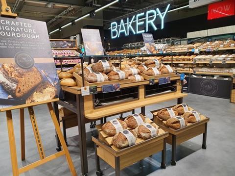 Inside a Marks & Spencer bakery with loaves on display