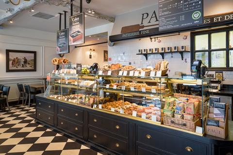 Inside a Paul Bakery shop with patisserie and sandwiches on display