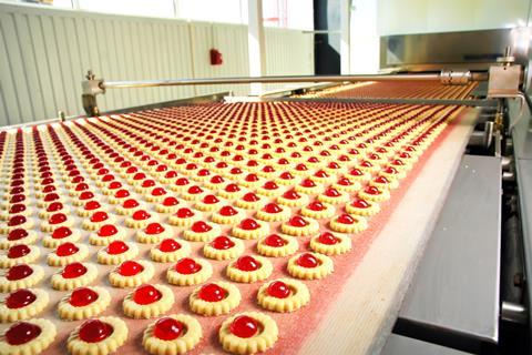 Biscuits with jam on production line