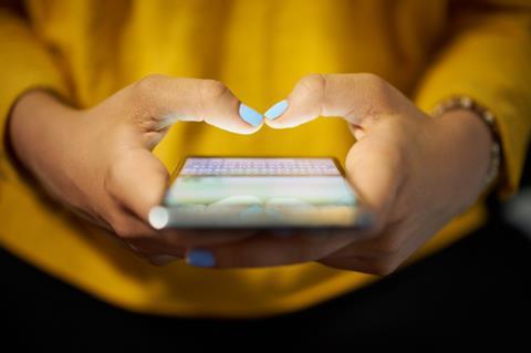 Woman texting on phone