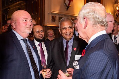 Shiraz Master (second left) meets with King Charles III during the Queen's Awards for Enterprise reception in 2021