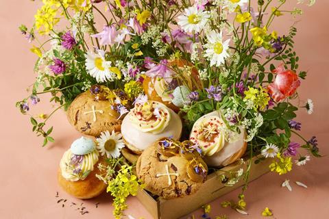 Crosstown Botanarchy cookie and doughnut box surrounded by wild flowers