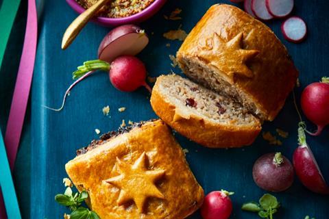 Sliced sausage roll with a star on top of the pastry